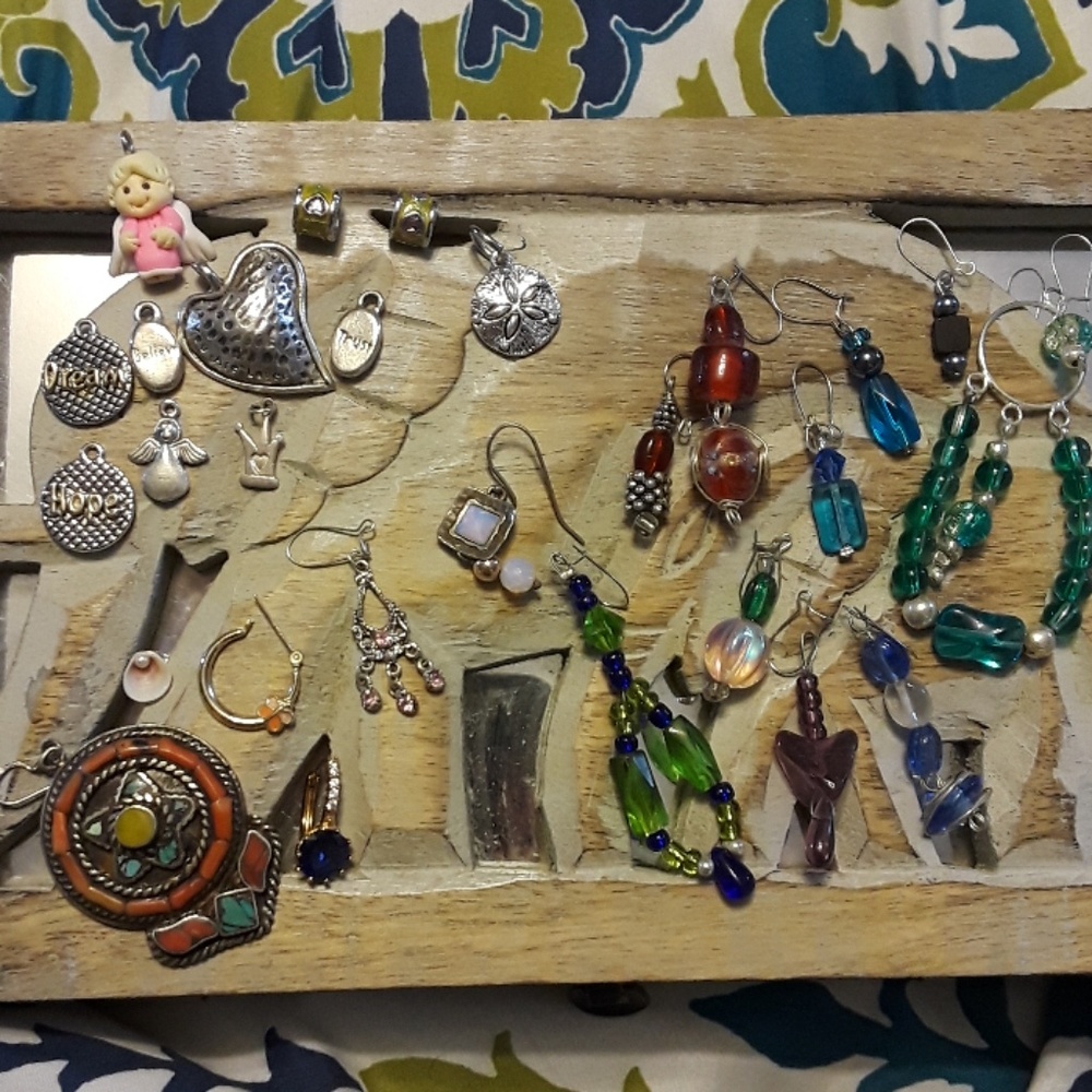Lot of charms and with lot of one earrings